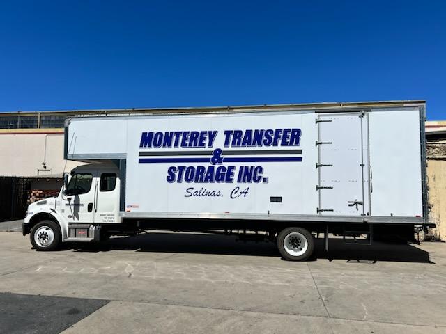 MTS residential moving truck Monterey Transfer & Storage Inc. moving truck parked outside a facility, showcasing professional residential moving services in Monterey, CA.